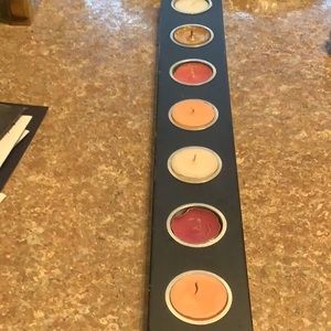 2 sets 2 SETS OF 7 COLORED TEA CANDLE. AND 5 p